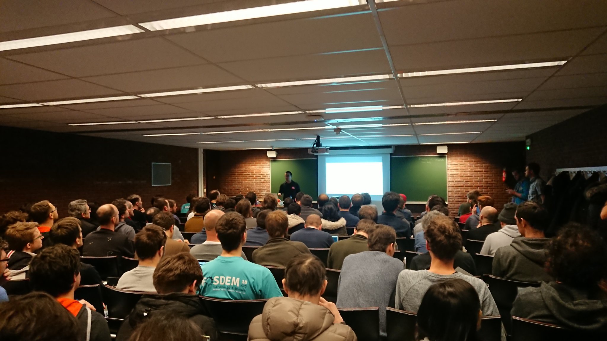 Presenting in front of a group of Rustaceans at FOSDEM 2018